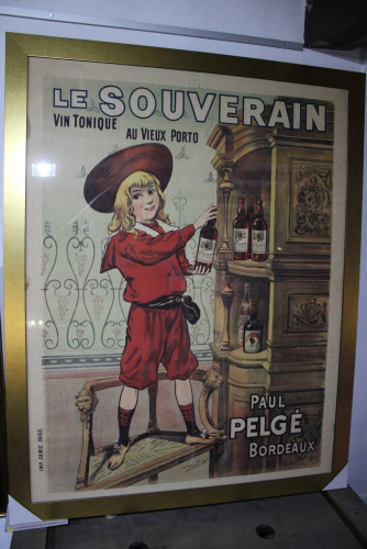 Portada del libro de Cartel del licor Le Souverain.- C. 1900.