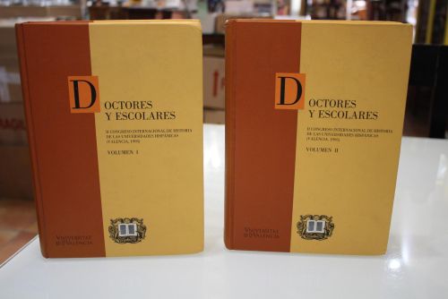 Portada del libro de Dos volúmenes.- Doctores y escolares. II Congreso Internacional de Historia de las Universidades Hispánicas...
